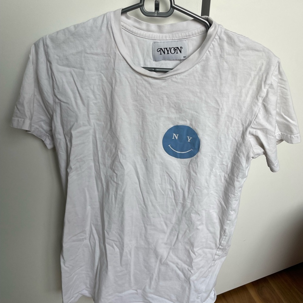 NYON White Tee with Blue Smile Logo